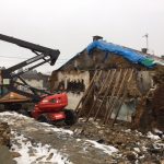 Démolition d'une maison brulée